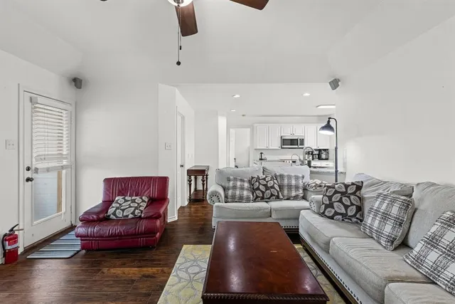 a living room with furniture and a couch