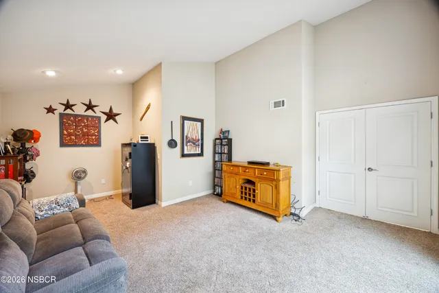 a view of a chairs and table on the terrace
