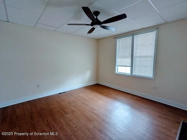 a view of an empty room and window