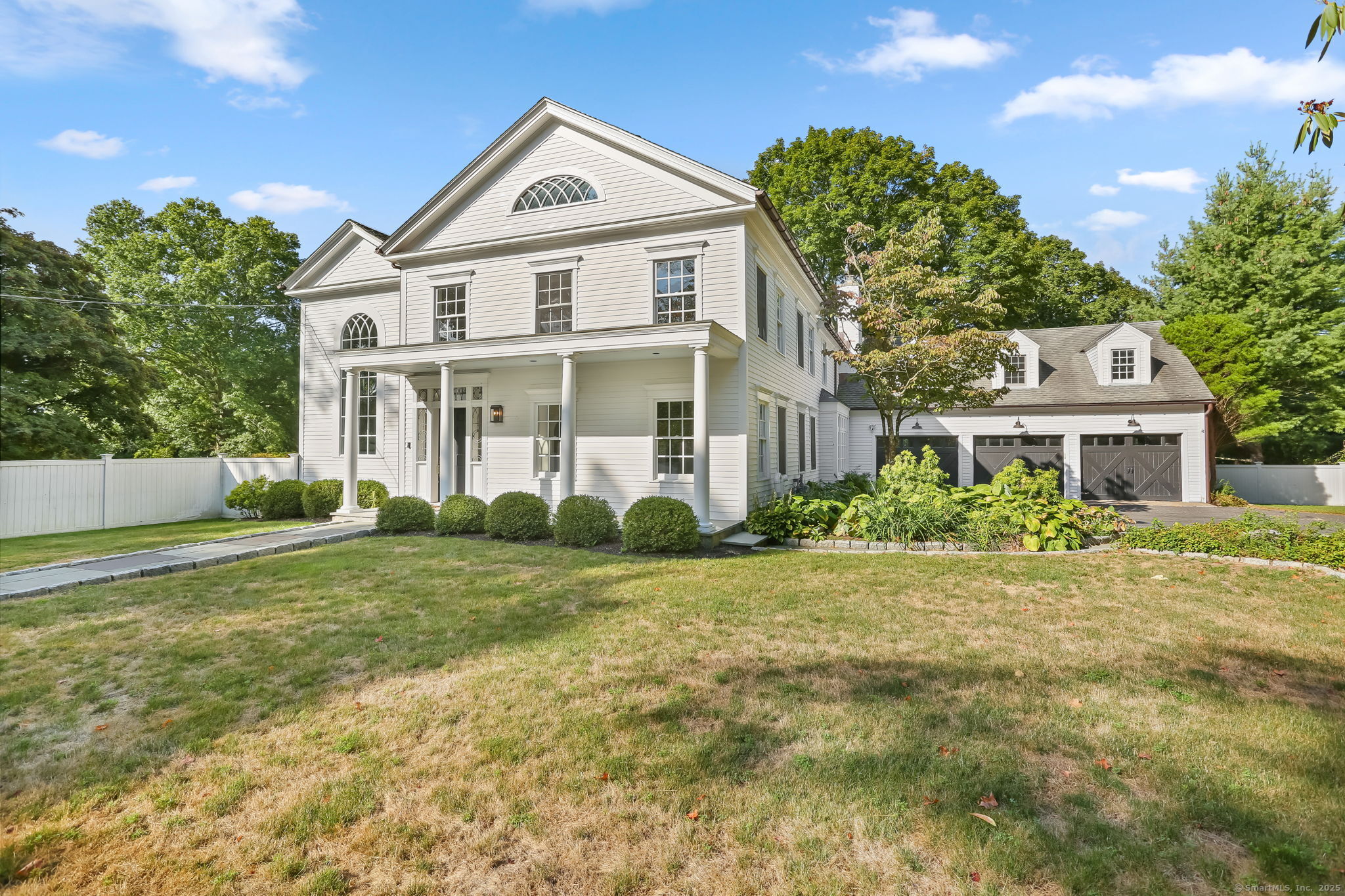 2493 Redding Road Fairfield, CT 06824 - Photo 1 of 1 a front view of a house with a yard