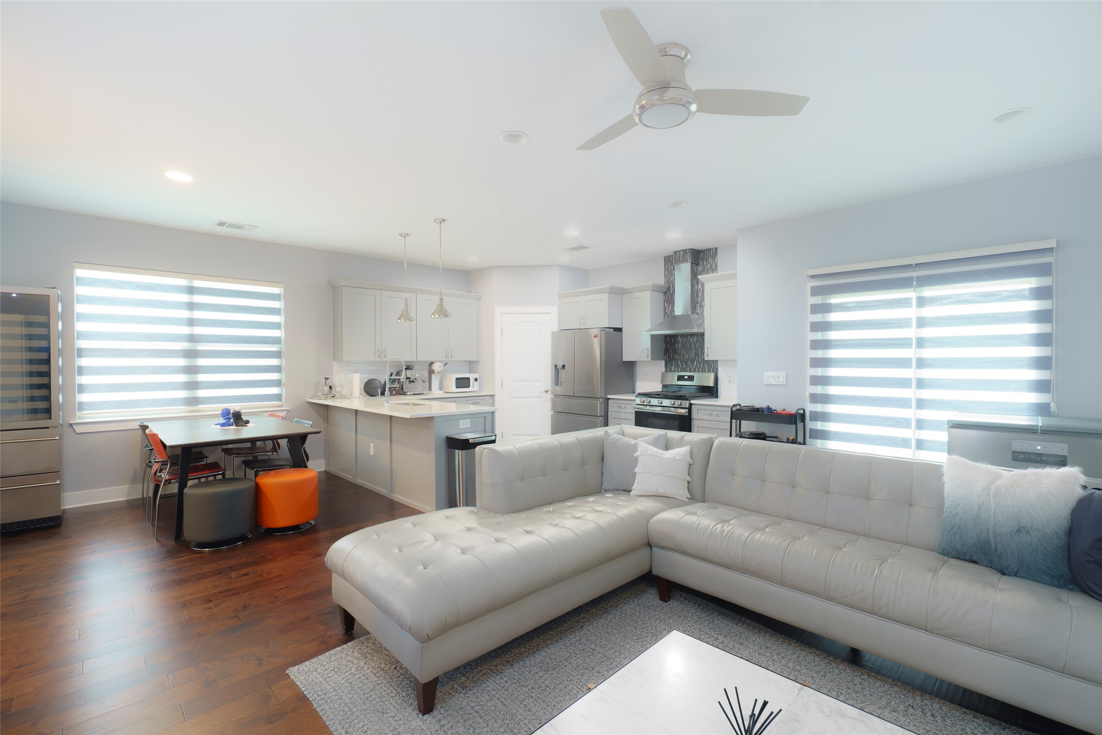 302 Delmar Avenue, Unit B Austin, TX 78752 - Photo 6 of 19 a living room with furniture and a large window