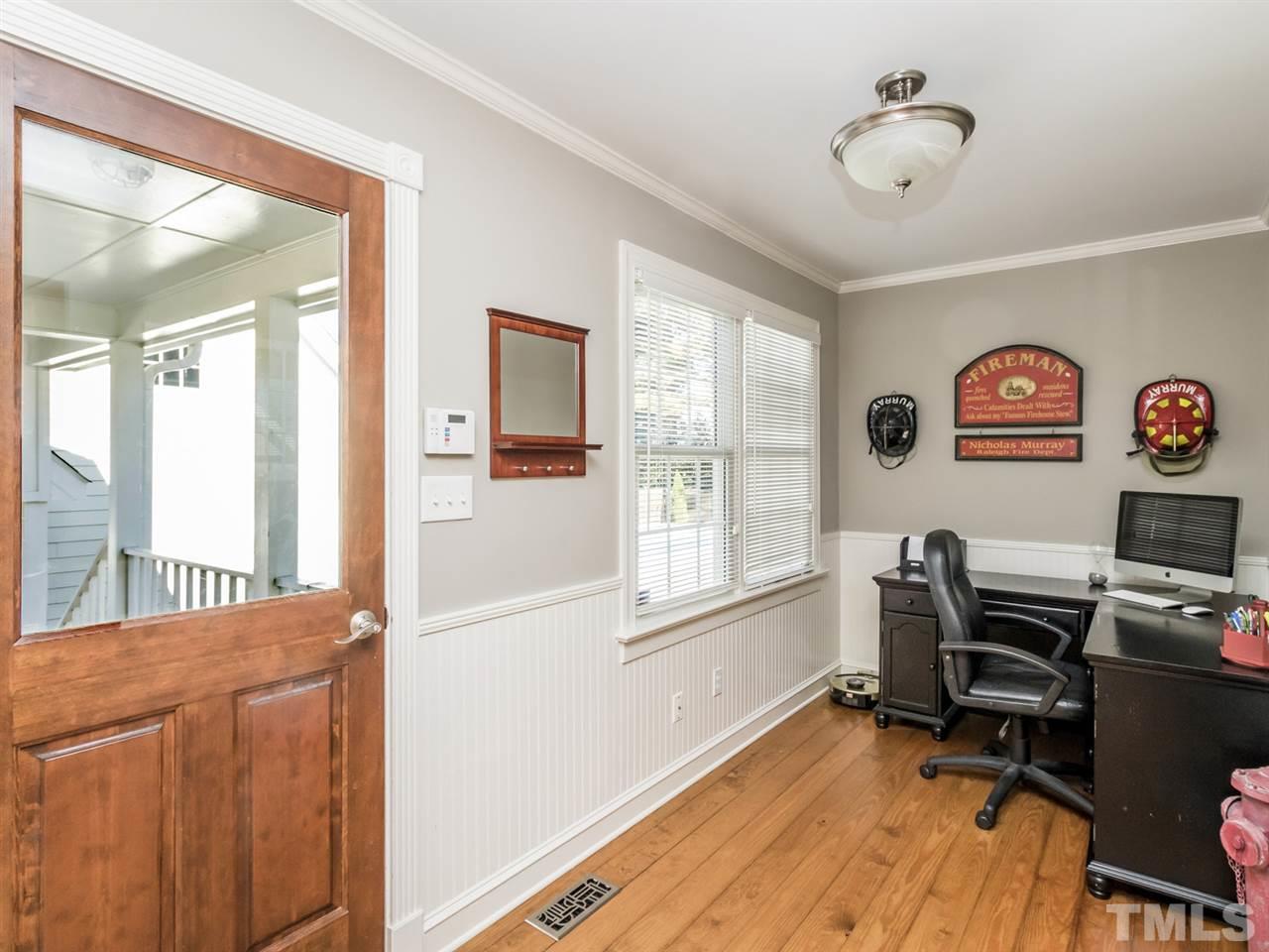 4108 Southall Road Raleigh, NC 27604 - Photo 15 of 25 a view of a workspace with furniture and a window