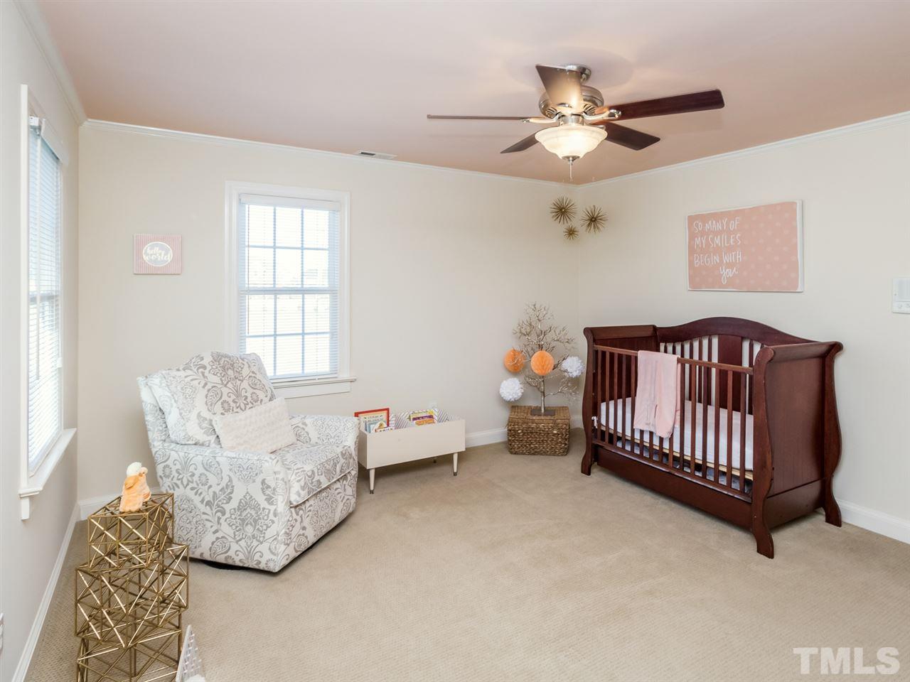 4108 Southall Road Raleigh, NC 27604 - Photo 16 of 25 a bedroom with furniture and window