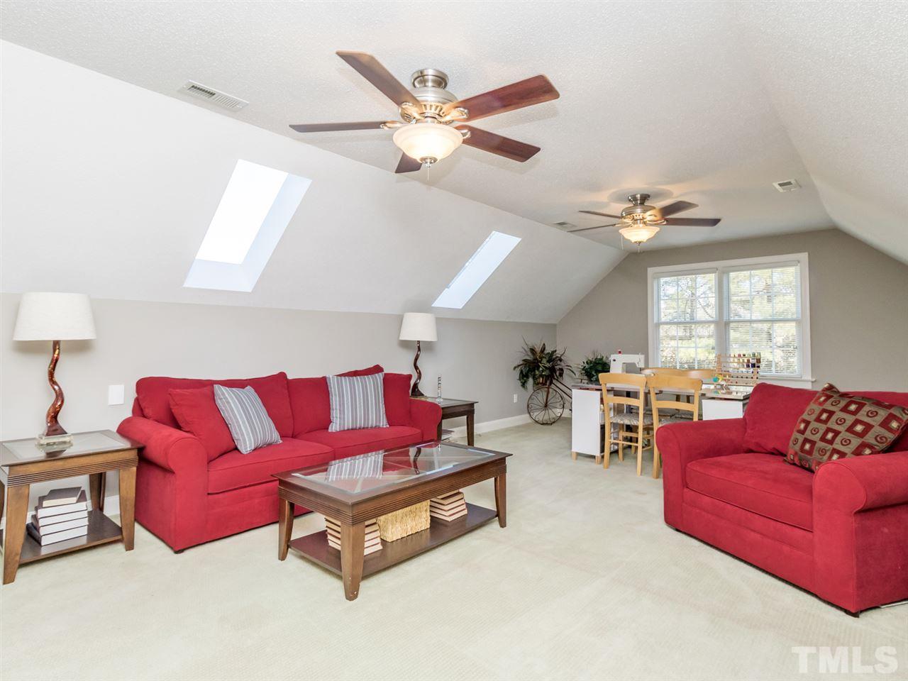 4108 Southall Road Raleigh, NC 27604 - Photo 18 of 25 a living room with furniture and a large window