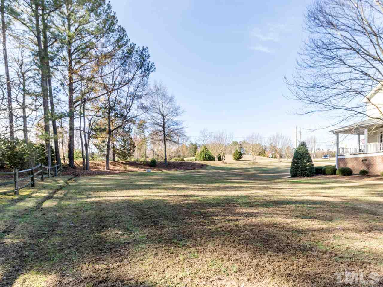 4108 Southall Road Raleigh, NC 27604 - Photo 24 of 25 a view of a water fountain in middle of the forest