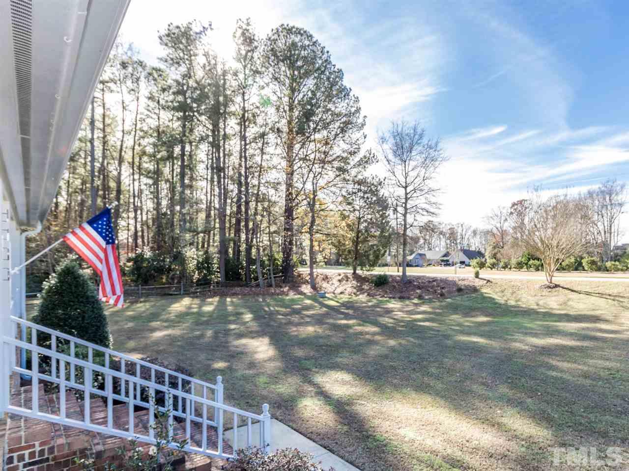 4108 Southall Road Raleigh, NC 27604 - Photo 4 of 25 a view of a yard with plants and trees