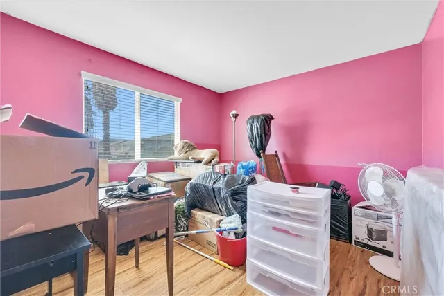 a room with furniture and a flat screen tv