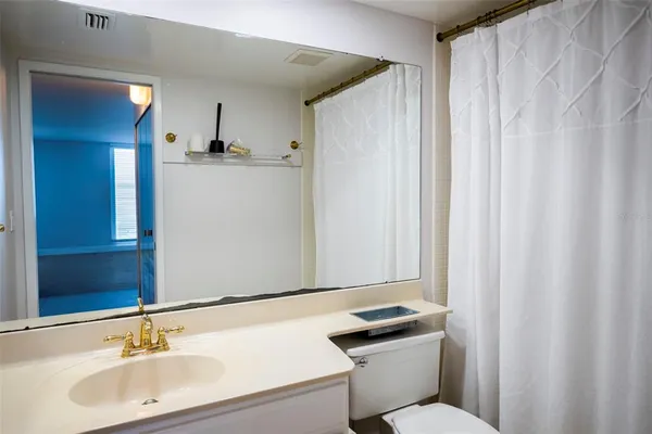 a view of a hallway with washer and dryer