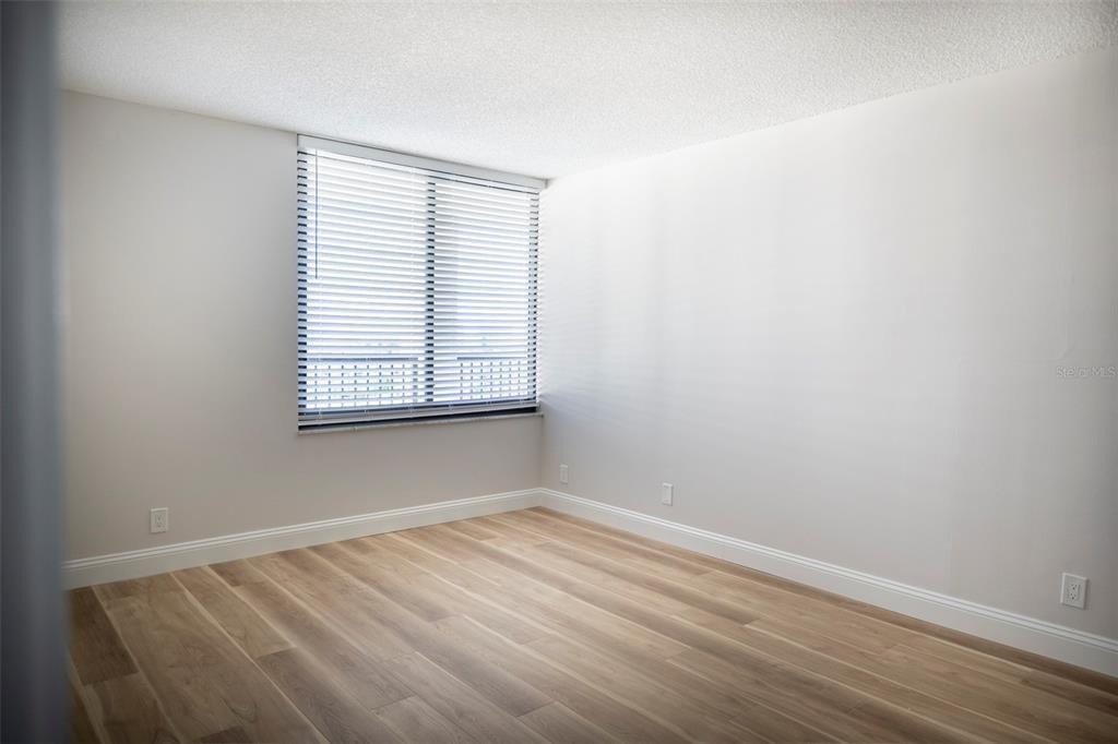 7100 Sunset Way, Unit 810 St. Pete Beach, FL 33706 - Photo 16 of 42 an empty room with a window