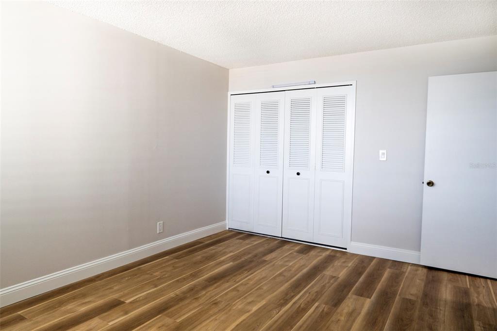 7100 Sunset Way, Unit 810 St. Pete Beach, FL 33706 - Photo 17 of 42 a view of an empty room