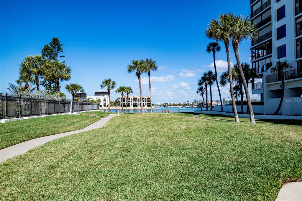 7100 Sunset Way, Unit 810 St. Pete Beach, FL 33706 - Photo 28 of 42 a view of a garden