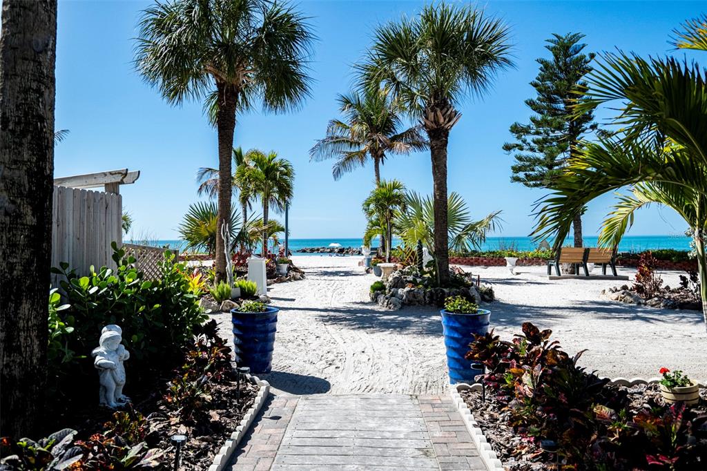 7100 Sunset Way, Unit 810 St. Pete Beach, FL 33706 - Photo 30 of 42 a view of a backyard