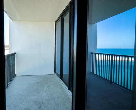 a kitchen with stainless steel appliances granite countertop a refrigerator sink and stove