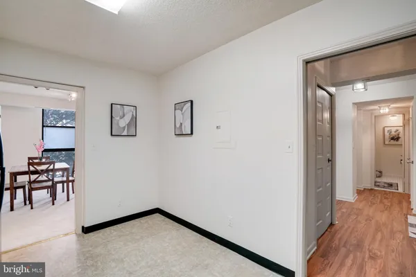a view of a livingroom with furniture and wooden floor