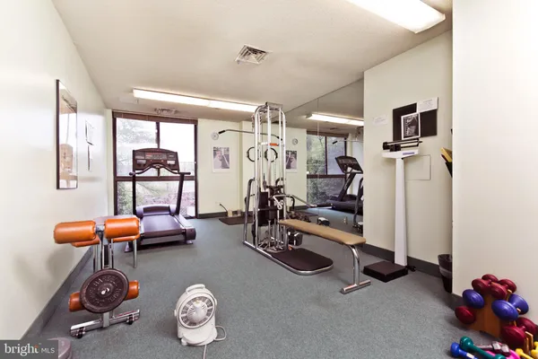 a view of a room with gym equipment