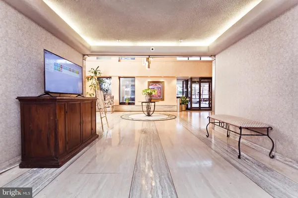a view of a living room and dining room