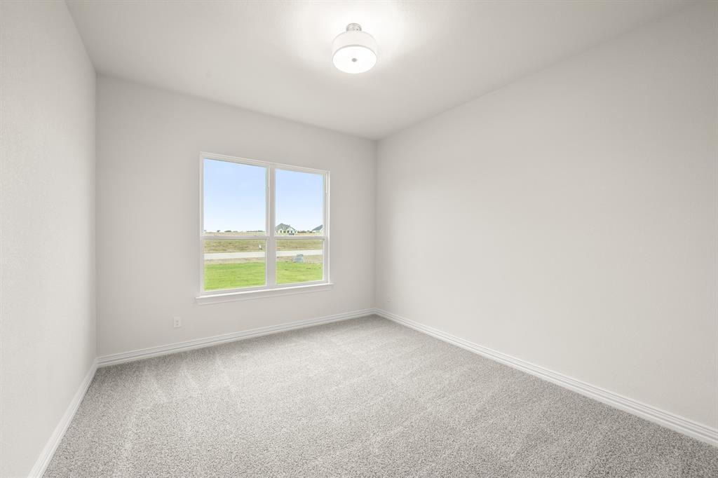211 Marie Lane Waxahachie, TX 75167 - Photo 12 of 24 an empty room with a window