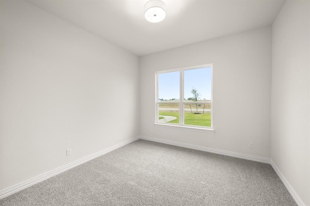 211 Marie Lane Waxahachie, TX 75167 - Photo 13 of 24 an empty room with a window
