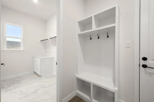 a bathroom with a sink and toilet