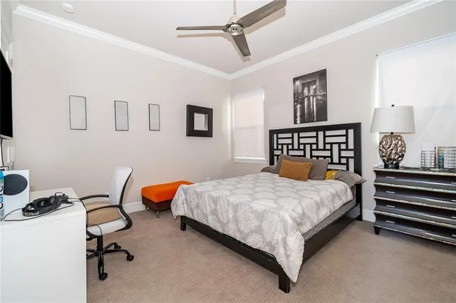 an aerial view of a house with outdoor space