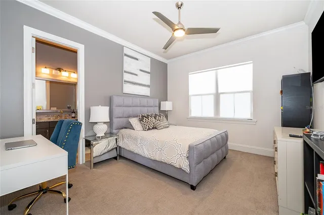 an aerial view of a house with a swimming pool