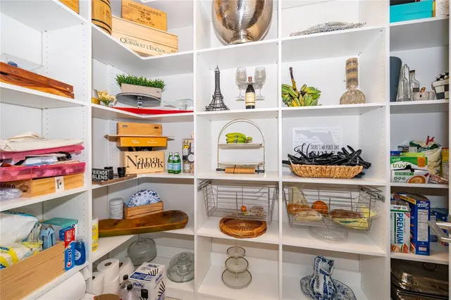 an aerial view of residential house with outdoor space and swimming pool