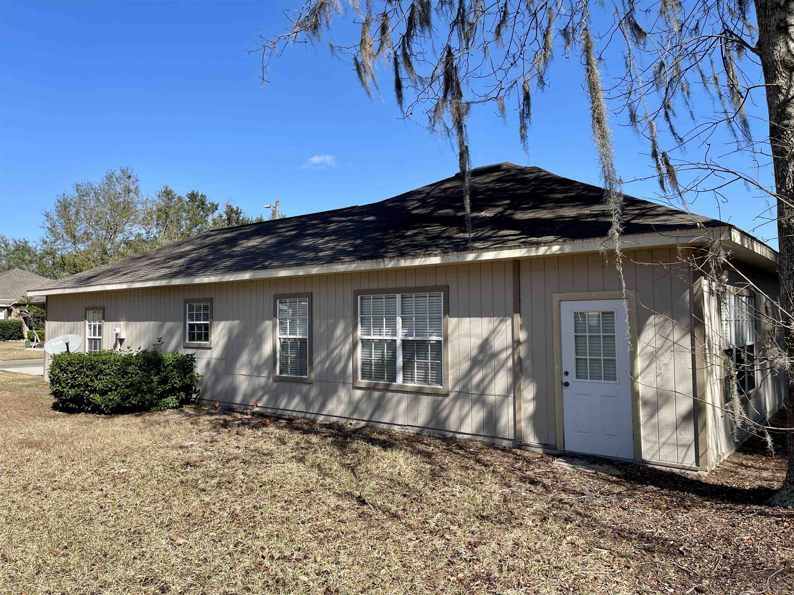 4841 Northwest 75th Road Gainesville, FL 32653 - Photo 20 of 25 a view of a house with backyard