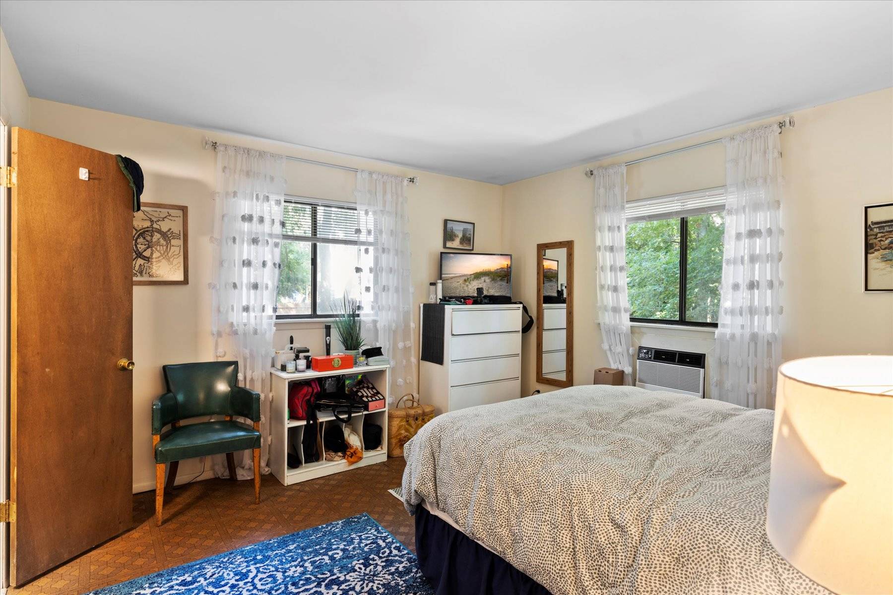 63 Harbor Avenue Sag Harbor, NY 11963 - Photo 6 of 18 a bed room with a bed and a chair