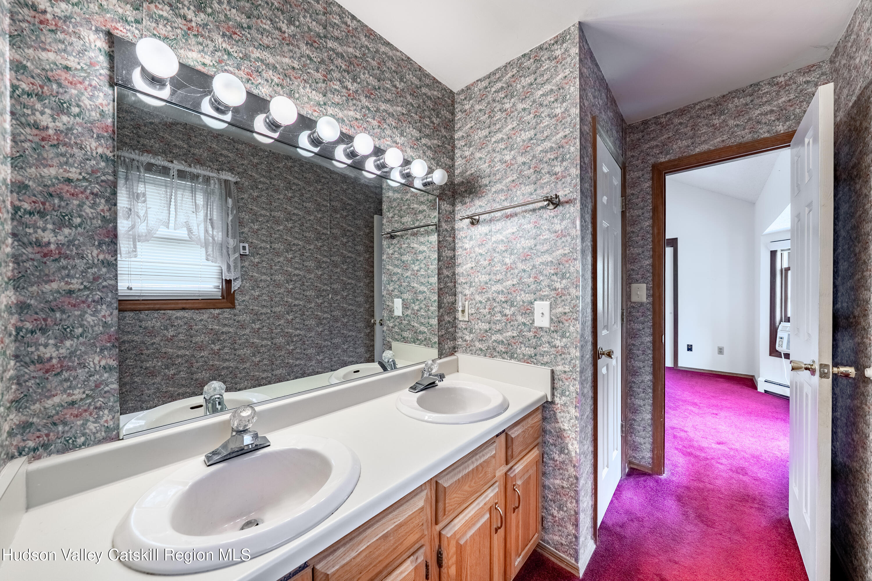32 Red Maple Road Saugerties, NY 12477 - Photo 17 of 26 a bathroom with a sink vanity granite and a mirror