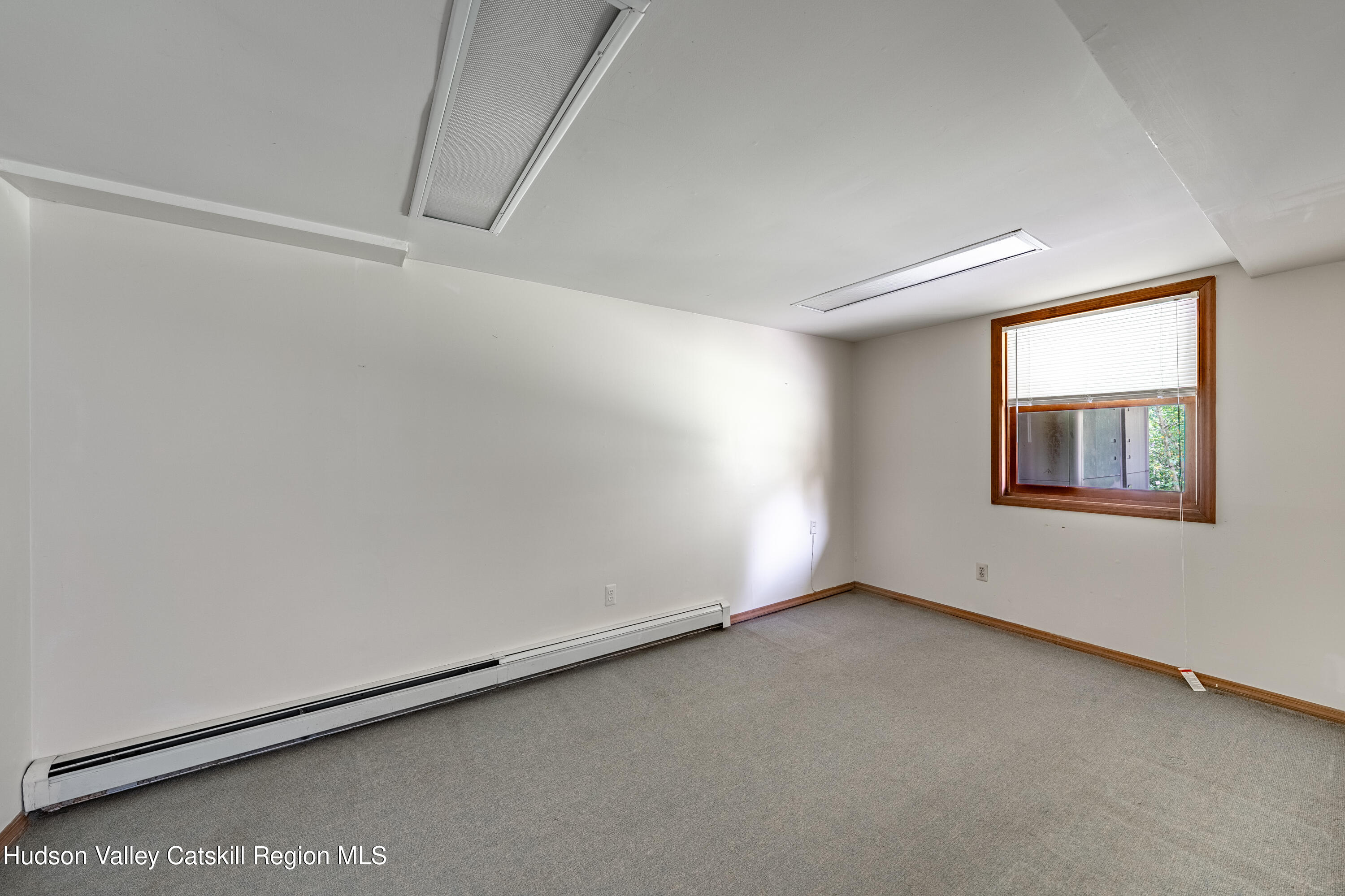 32 Red Maple Road Saugerties, NY 12477 - Photo 25 of 26 a view of an empty room with a window