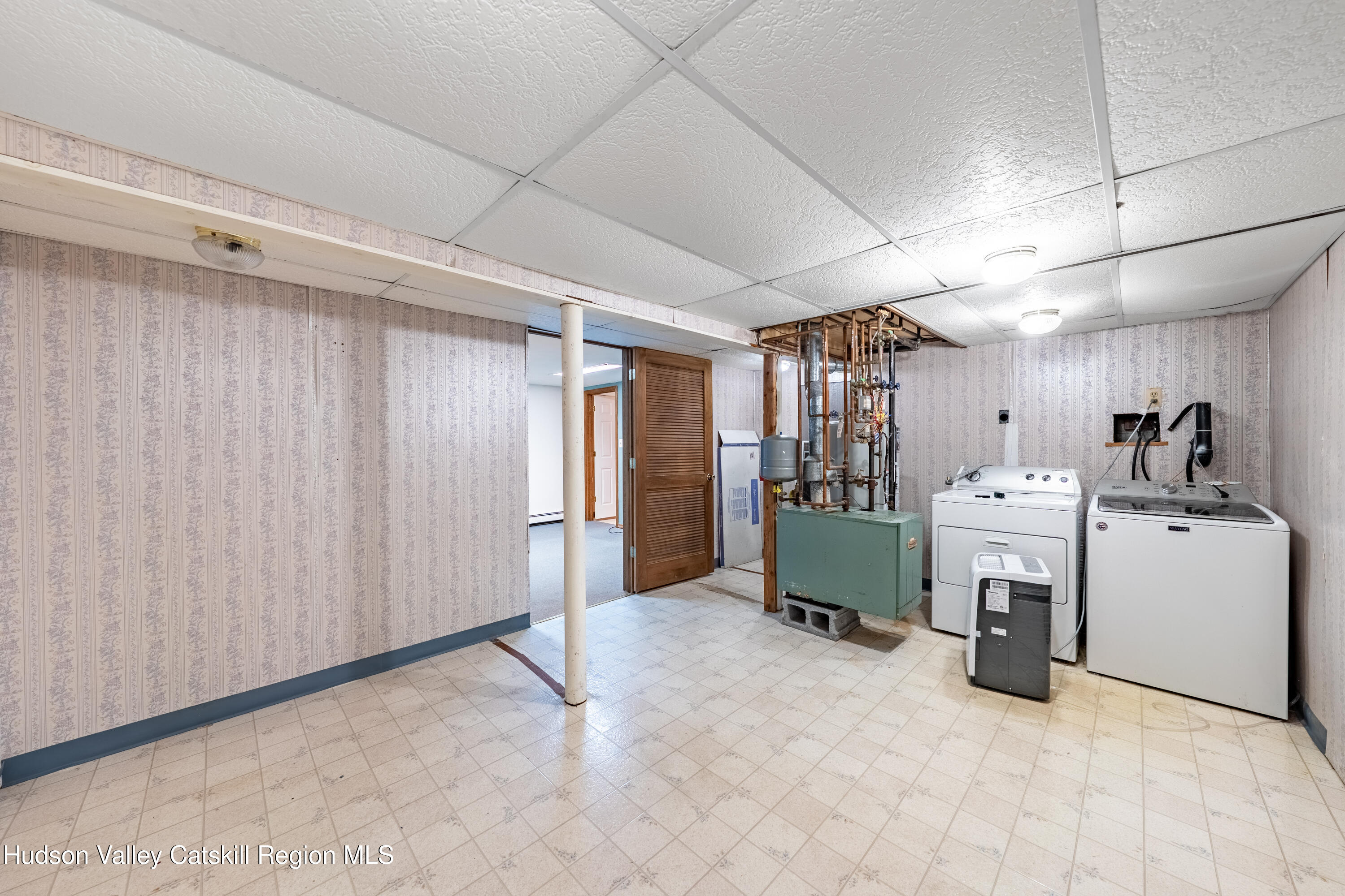 32 Red Maple Road Saugerties, NY 12477 - Photo 26 of 26 a room with a washing machine and sink