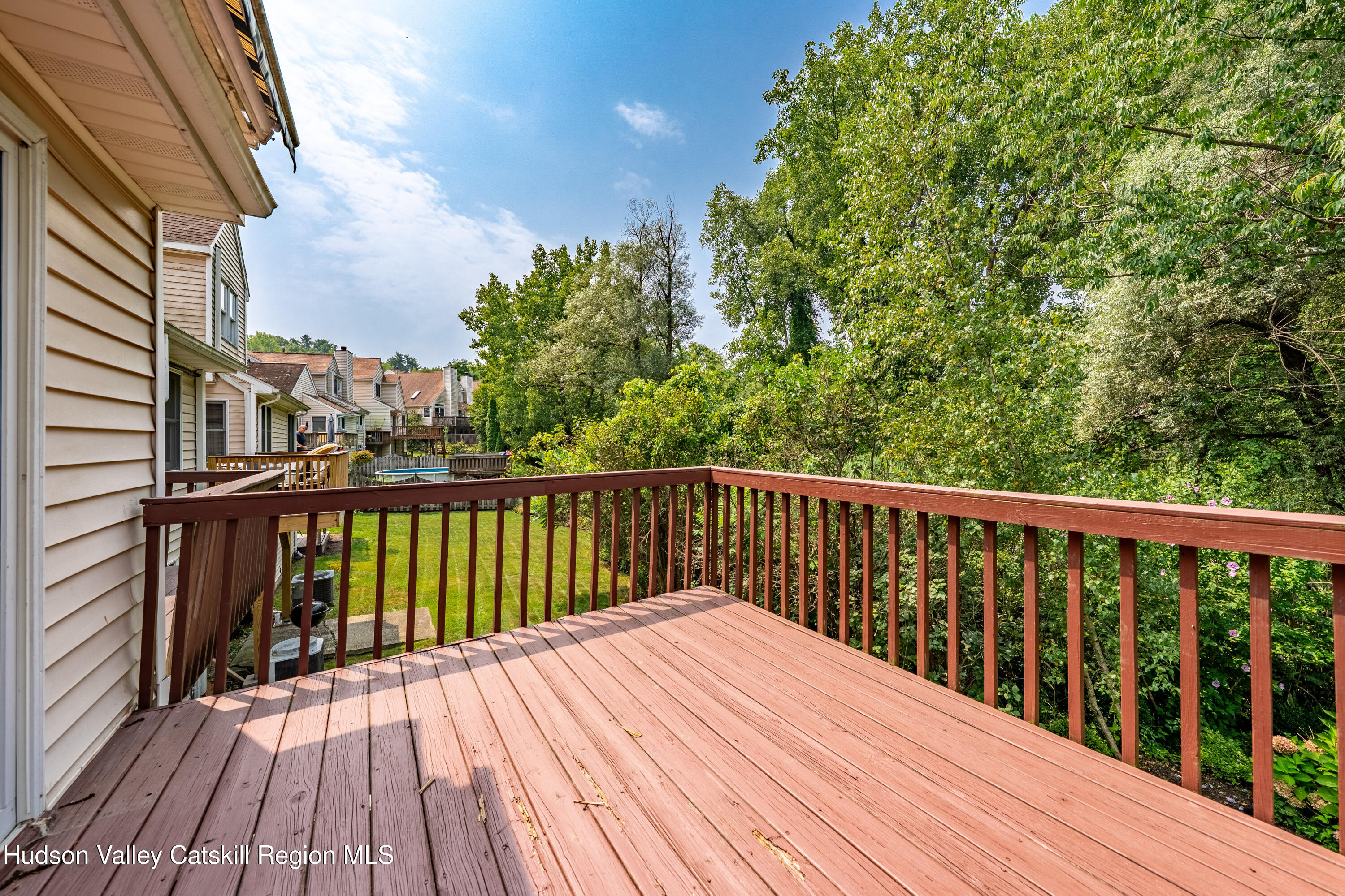 32 Red Maple Road Saugerties, NY 12477 - Photo 7 of 26 a balcony with wooden floor and fence