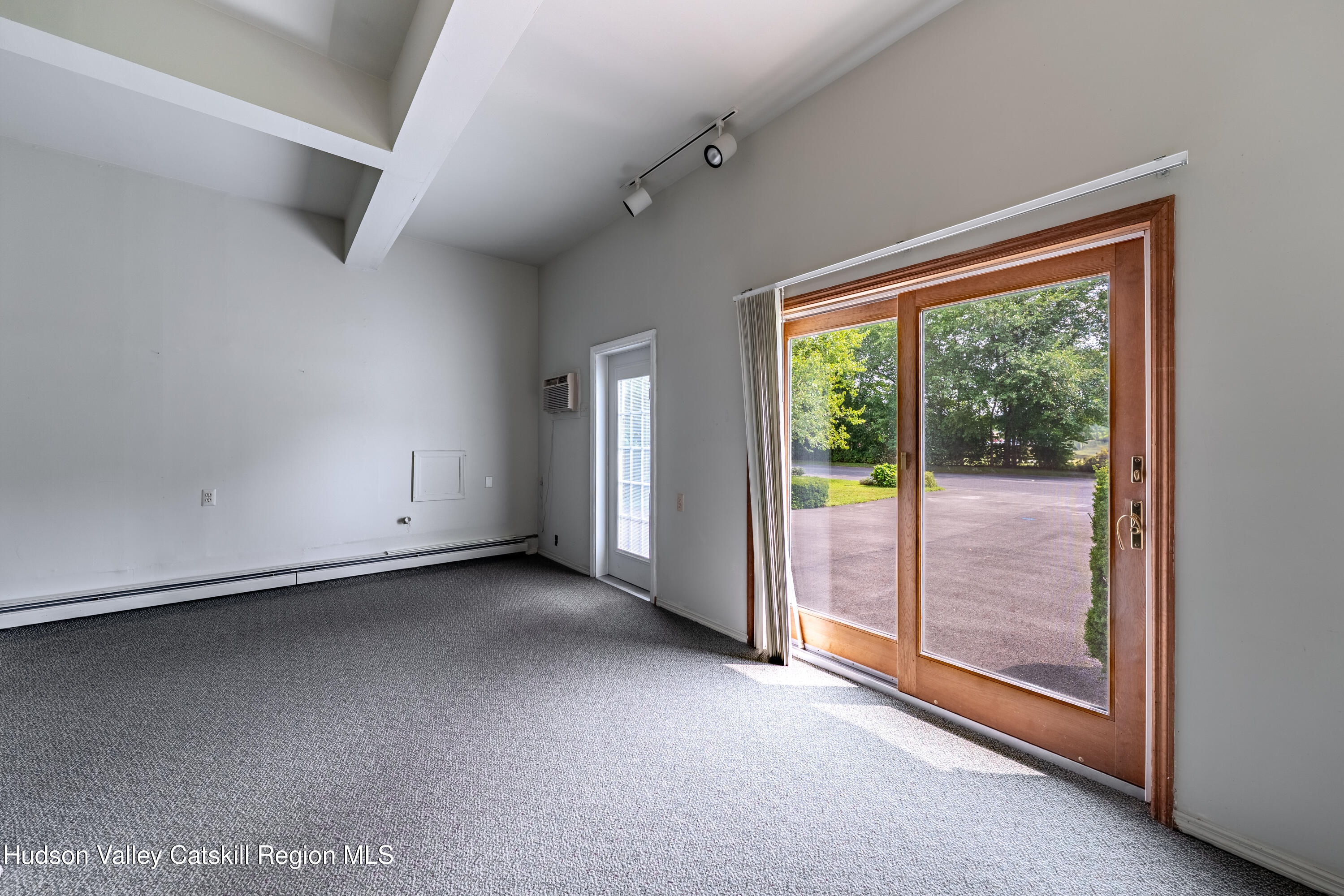 32 Red Maple Road Saugerties, NY 12477 - Photo 10 of 26 wooden floor in an empty room with a window