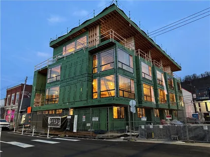 a view of a building with a street