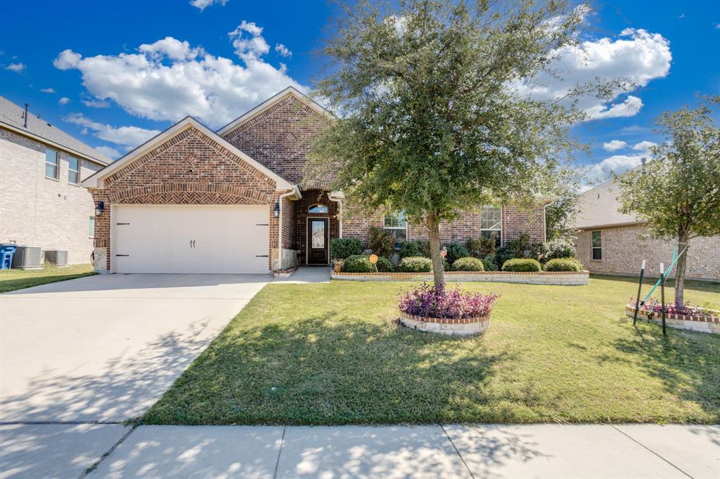 248 Georgetown Drive Forney, TX 75126 - Photo 2 of 39 a backyard of a house with table and chairs