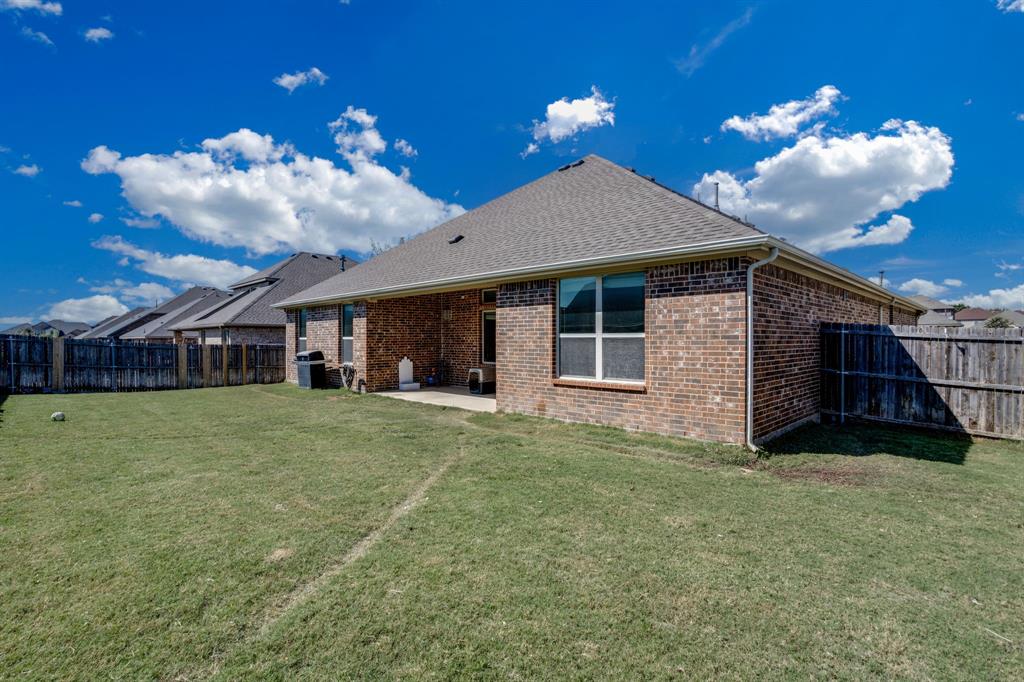 248 Georgetown Drive Forney, TX 75126 - Photo 33 of 39 a view of a house with a yard
