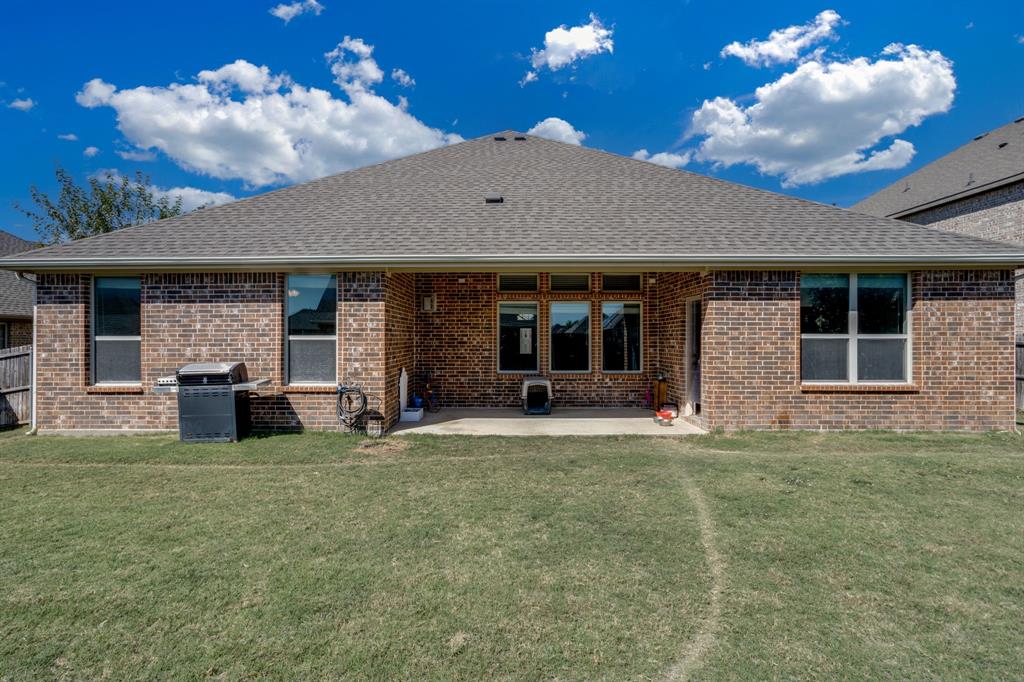 248 Georgetown Drive Forney, TX 75126 - Photo 35 of 39 a view of a house with patio