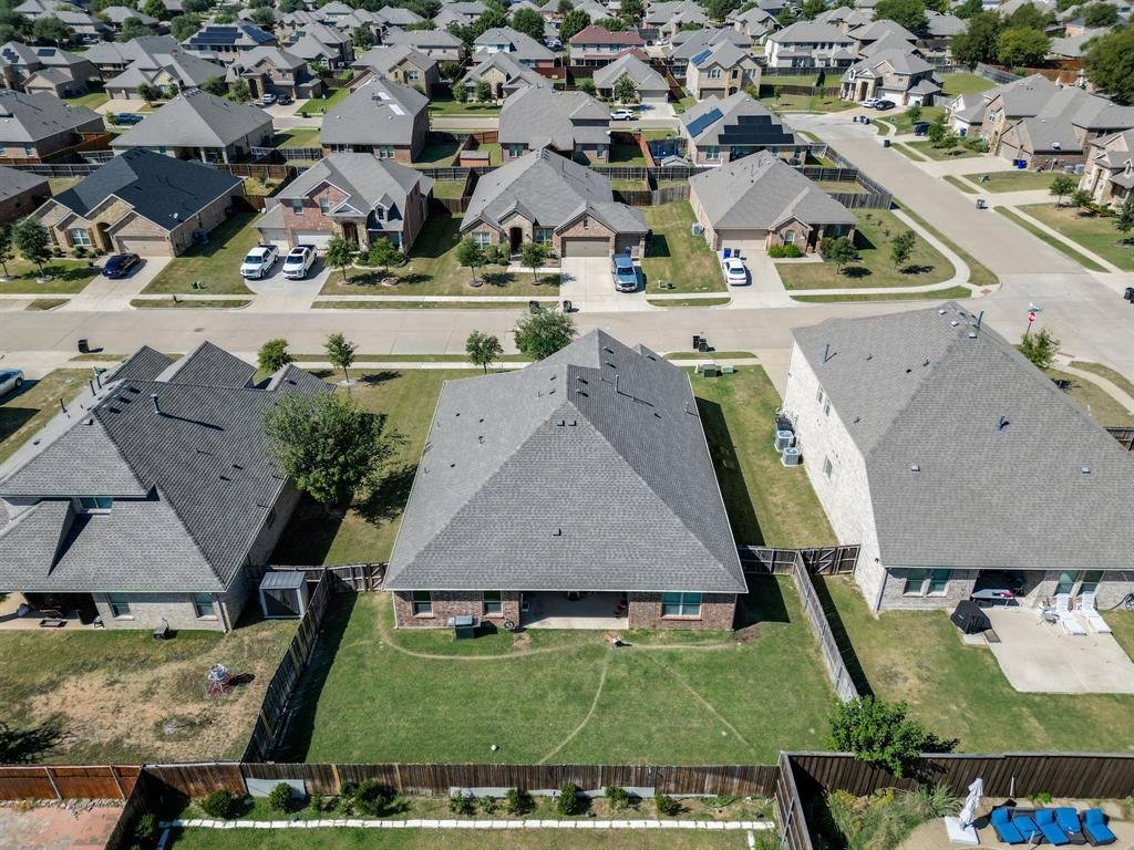 248 Georgetown Drive Forney, TX 75126 - Photo 38 of 39 an aerial view of residential houses with outdoor space and swimming pool