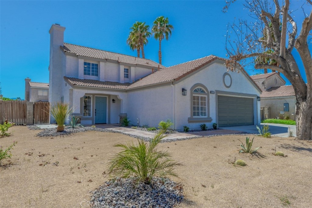 80929 Rio Grande Avenue Indio, CA 92201 - Photo 1 of 1 a front view of a house with a yard