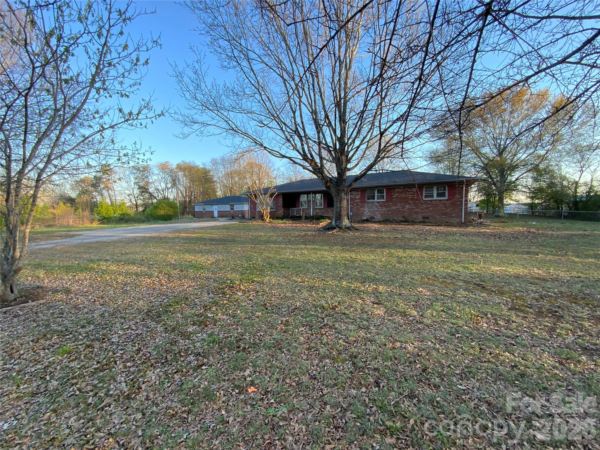 154 Lovelace Road Forest City, NC 28043 - Photo 17 of 17 a view of a yard with a house
