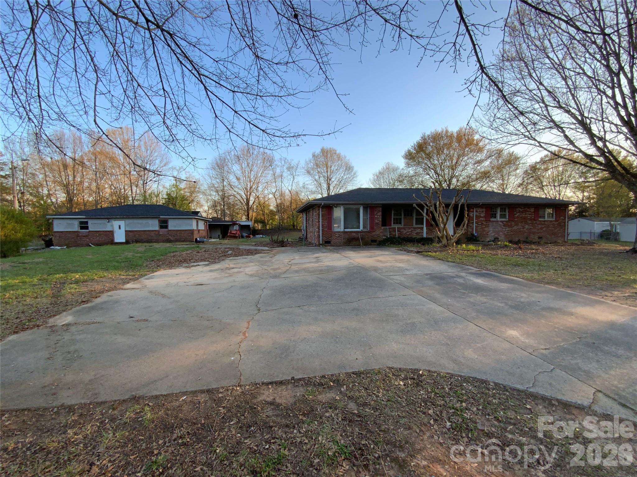 154 Lovelace Road Forest City, NC 28043 - Photo 3 of 17 a view of a house with a yard