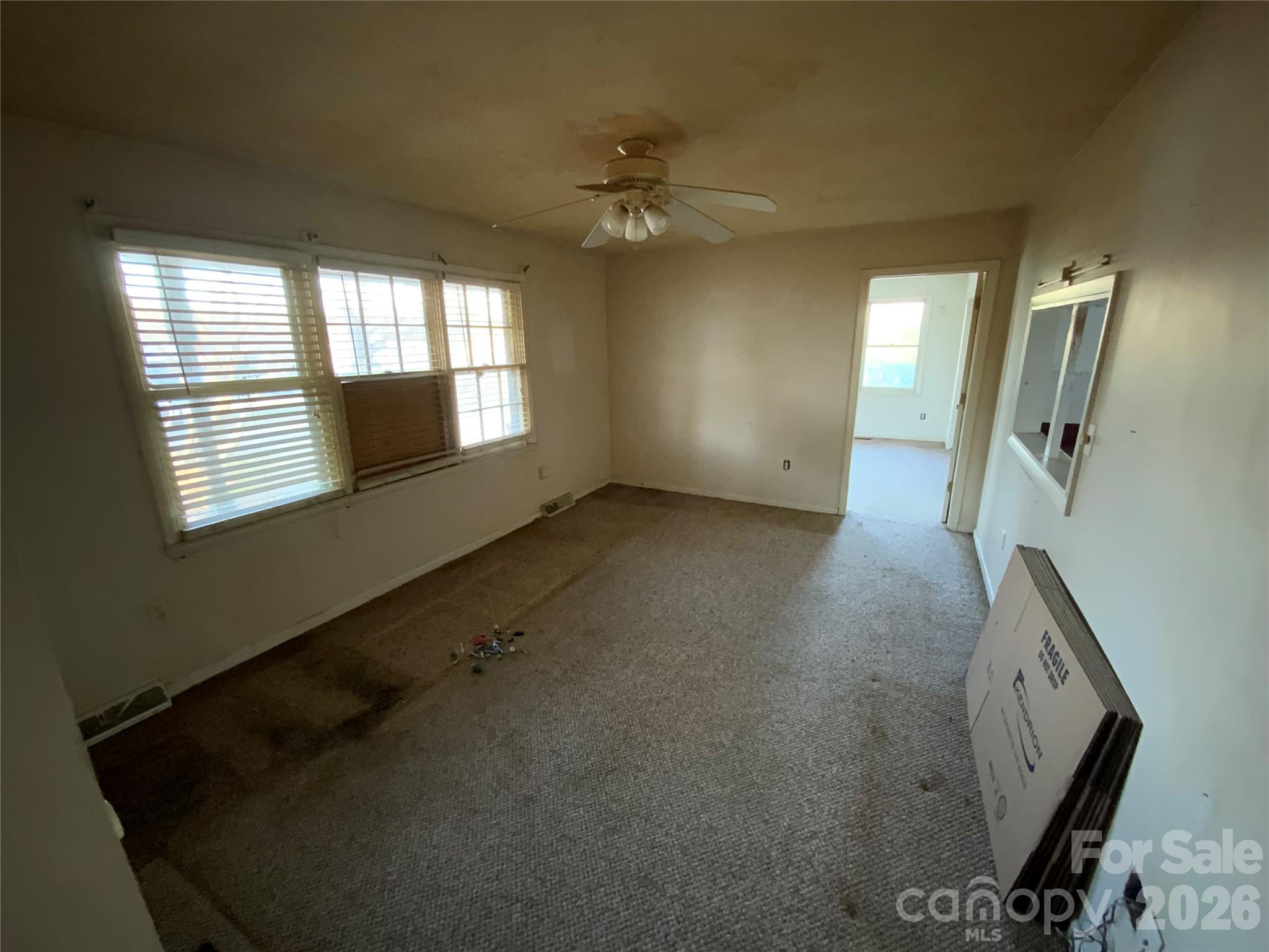 154 Lovelace Road Forest City, NC 28043 - Photo 5 of 17 wooden floor in an empty room with a window