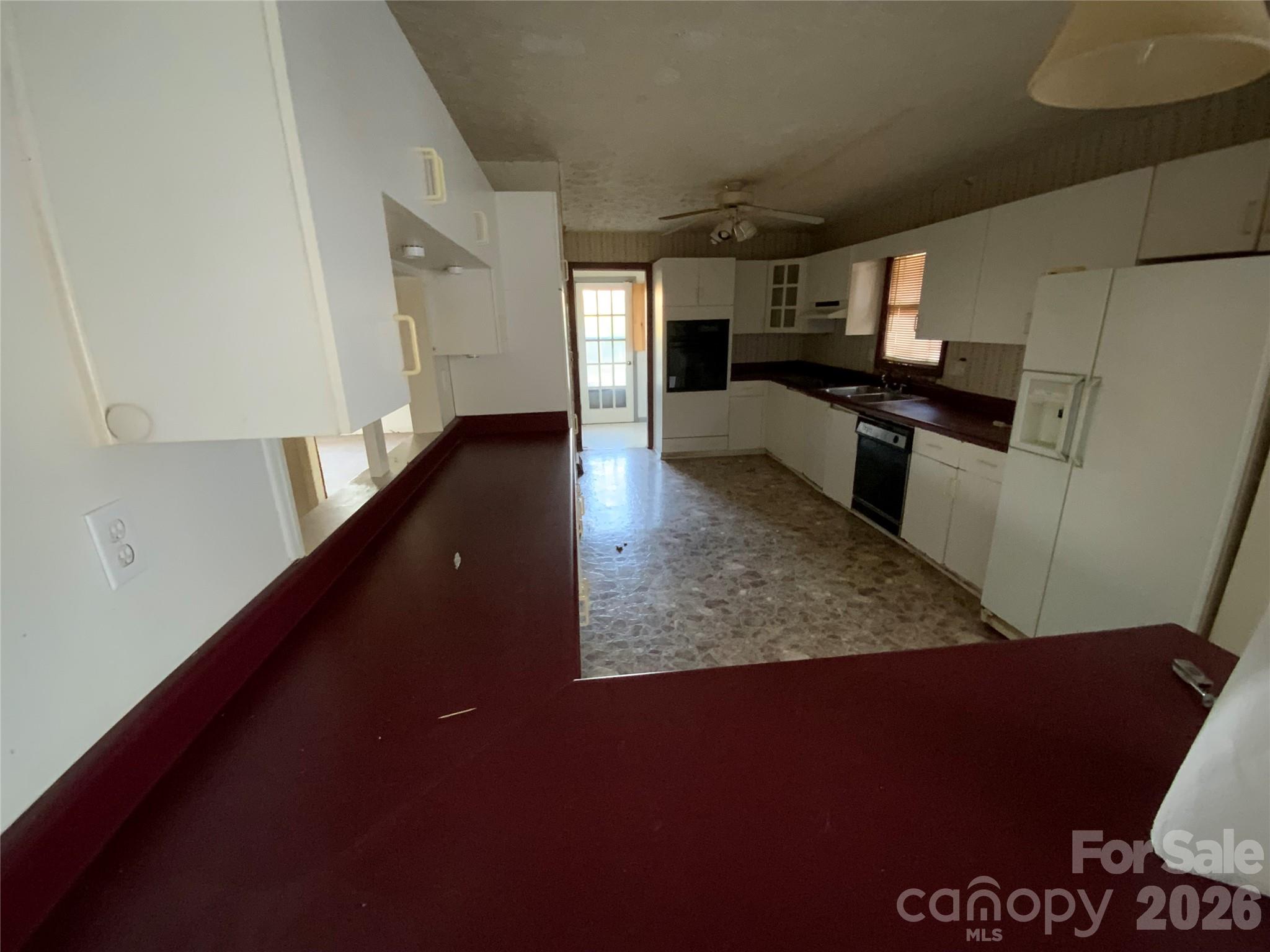 154 Lovelace Road Forest City, NC 28043 - Photo 6 of 17 a view of a kitchen with a sink