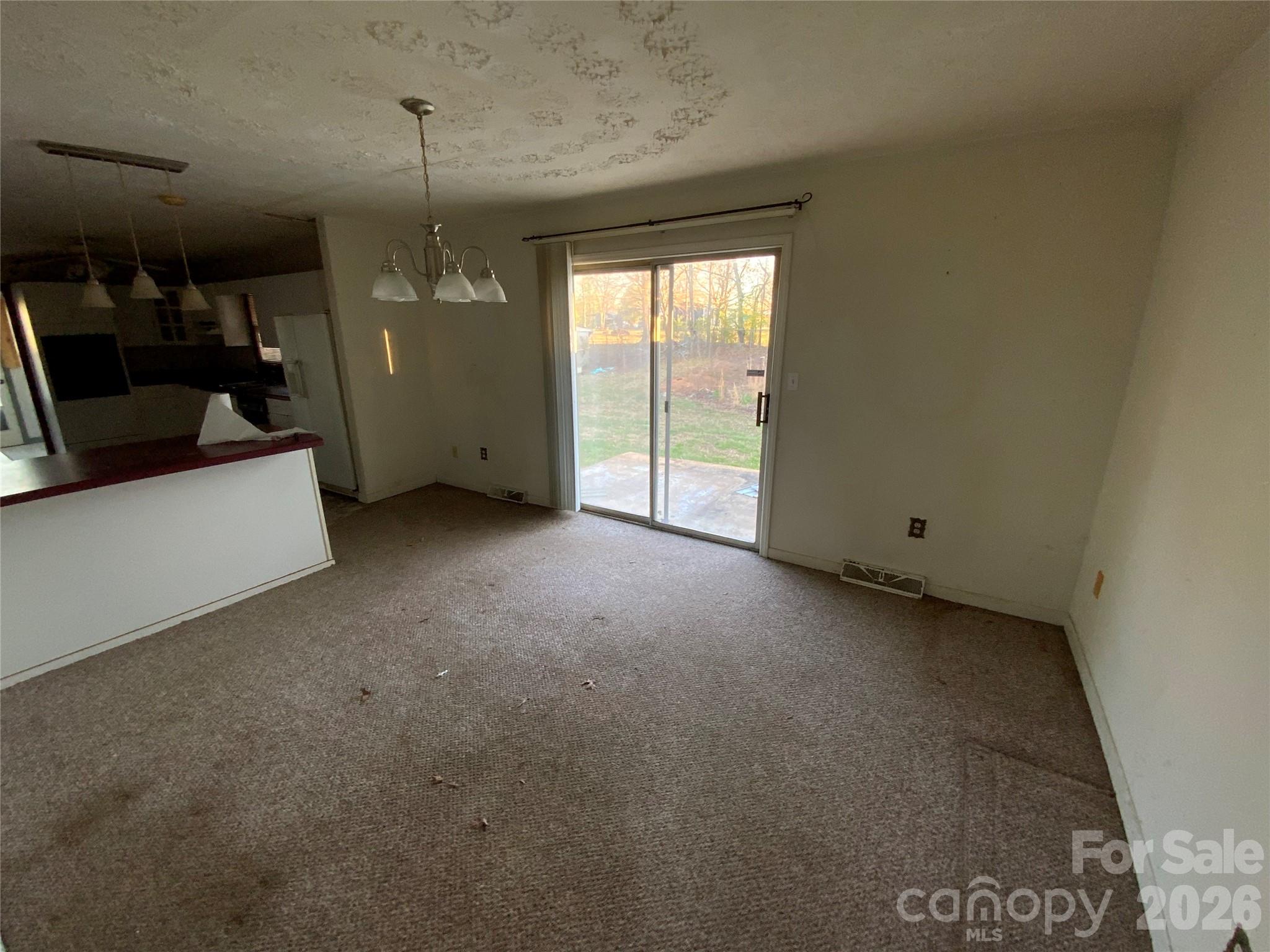 154 Lovelace Road Forest City, NC 28043 - Photo 8 of 17 a view of a room window and a kitchen