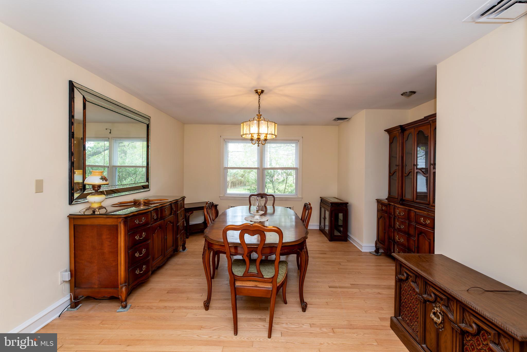 27 South State Street Vineland, NJ 08360 - Photo 12 of 46 a view of a a dining room with furniture window and wooden floor