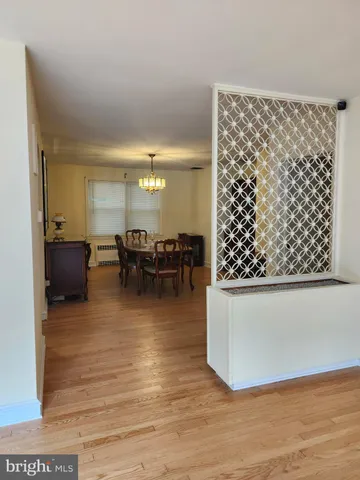 a view of a living room and dining room