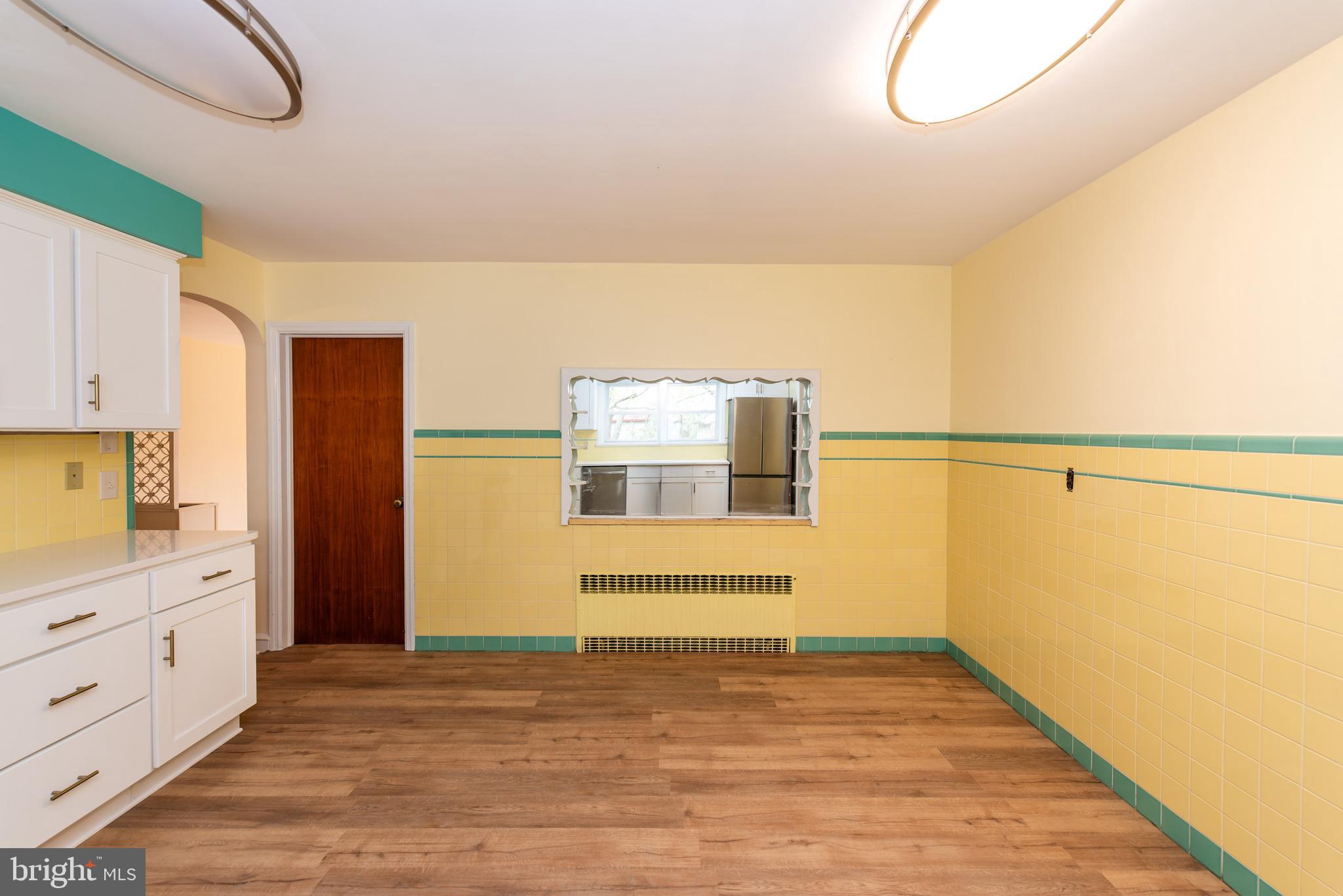 27 South State Street Vineland, NJ 08360 - Photo 23 of 46 a view of a kitchen with a sink and a window