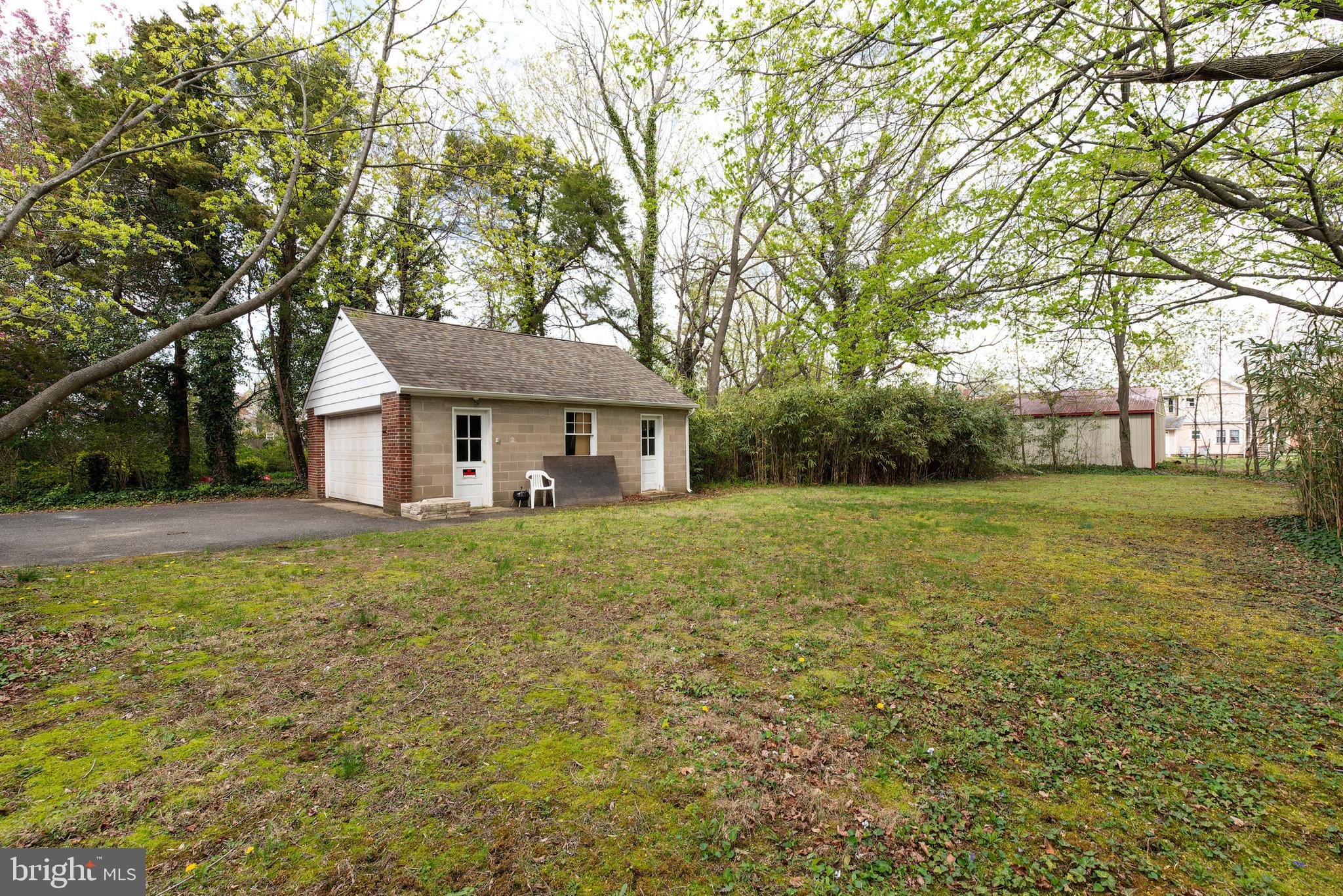 27 South State Street Vineland, NJ 08360 - Photo 40 of 46 a front view of a house with yard and green space