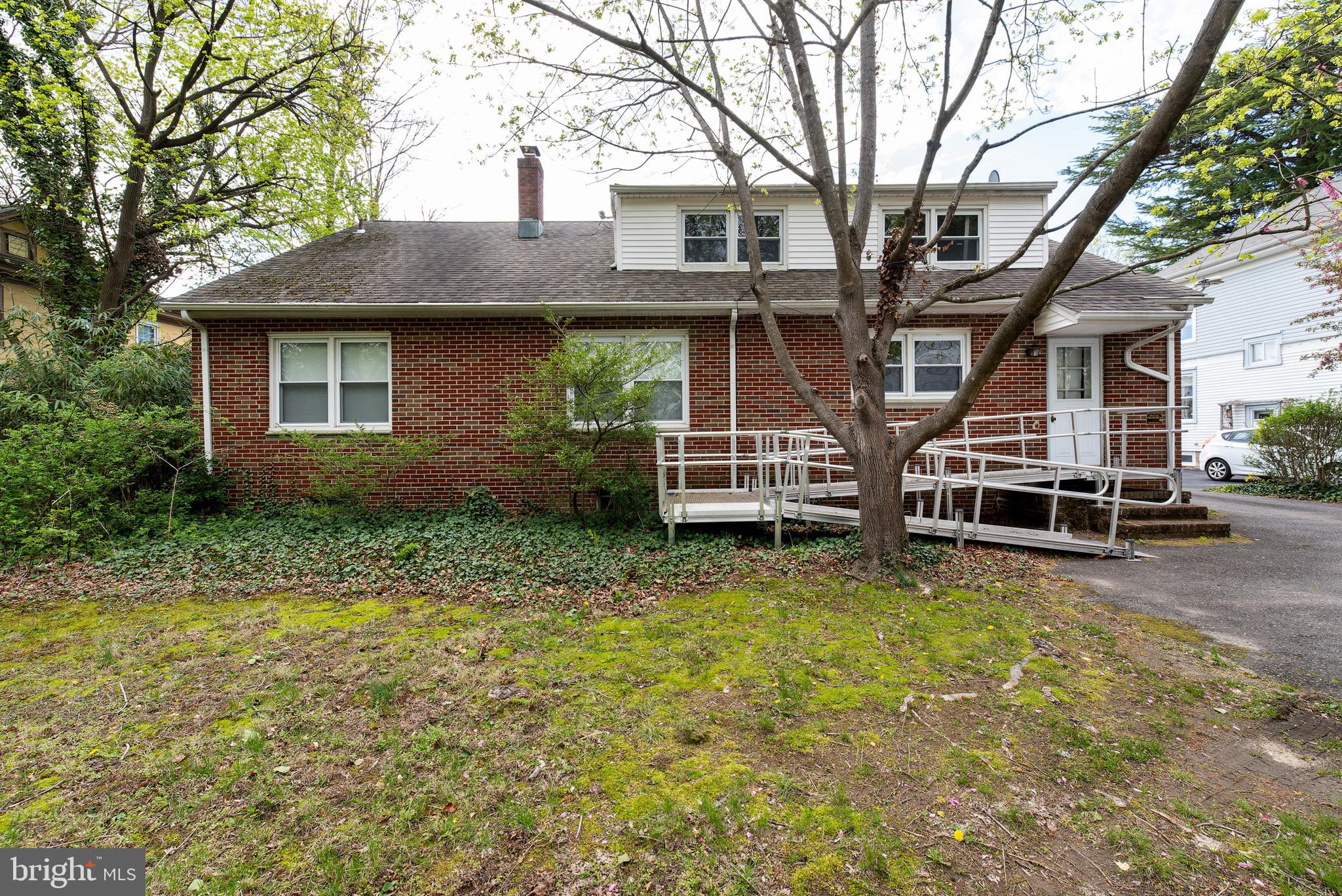 27 South State Street Vineland, NJ 08360 - Photo 41 of 46 a front view of a house with a yard