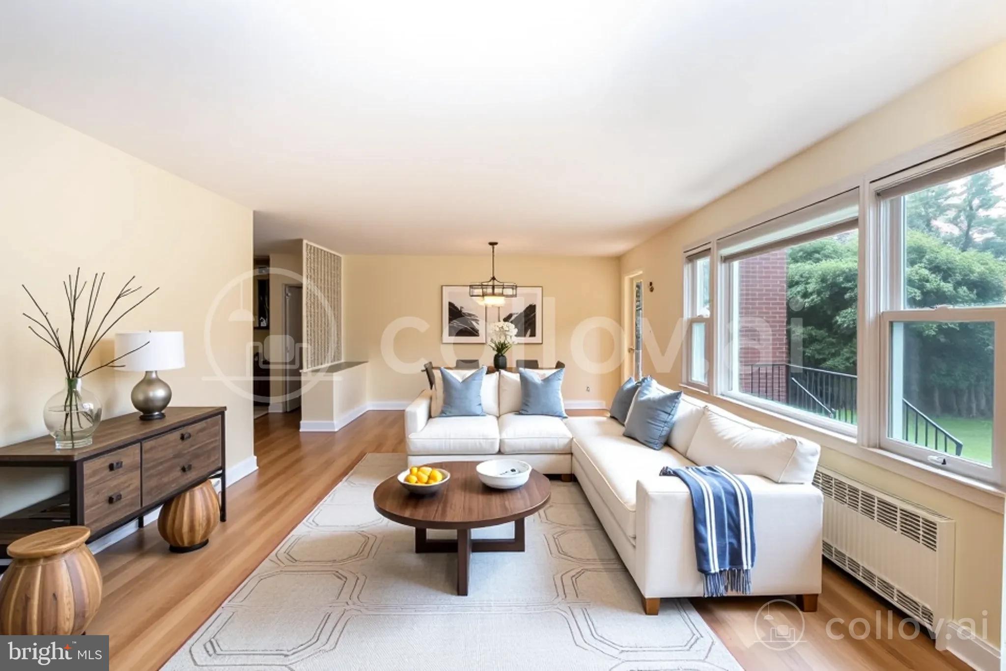 27 South State Street Vineland, NJ 08360 - Photo 10 of 46 a living room with furniture and a large window